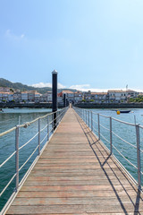 Fototapeta premium view of the pedestrian pier in the port