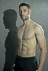 Portrait of young male body-builder