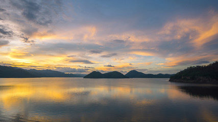 beautiful sunset on the reservoir at Khuean Srinagarindra National Park kanchanaburi povince , landscape Thailand 
