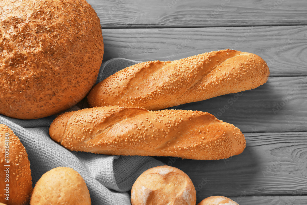 Canvas Prints Delicious bread on wooden table