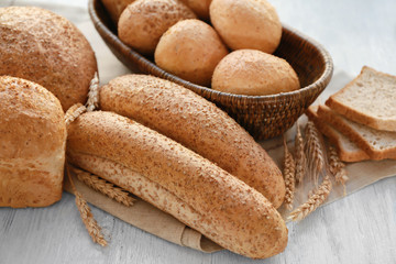 Beautiful composition with bakery products on wooden table