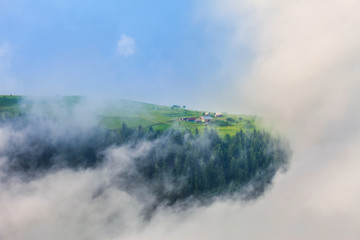 Majestic view on beautiful fog mountains in mist landscape. Dramatic unusual scene. Travel background. Exploring beauty world. Carpathian mountains. Ukraine. Europe.