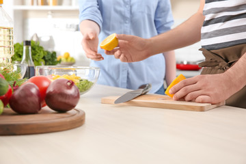 Chef giving cooking classes in kitchen