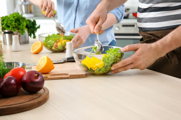 Chef giving cooking classes in kitchen