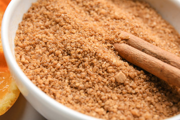 Cinnamon sugar in white bowl, closeup