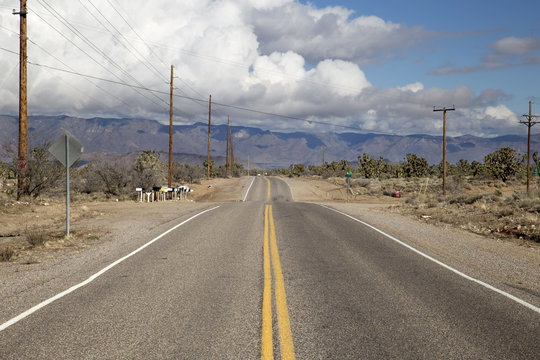 Asphalt road/highway with mailboxes through desert (Arizona, USA)