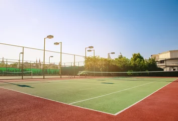 Zelfklevend Fotobehang Beautiful tennis court in sunny day © Africa Studio