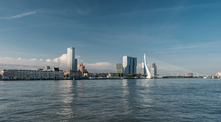 Fototapeta na wymiar Rotterdam city cityscape skyline with Erasmus bridge and river. South Holland, Netherlands.
