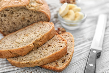 Sliced banana bread on wooden table