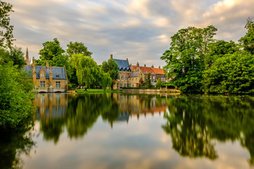 Fototapeta na wymiar Bruges (Brugge) cityscape with Minnewater lake