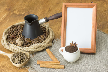 Coffee beans in a ring of hemp-center Turk, star anise on a background of brown wood. Next frame with a white background for the label.