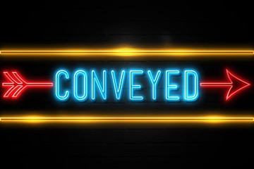 Fototapeta premium Conveyed - fluorescent Neon Sign on brickwall Front view