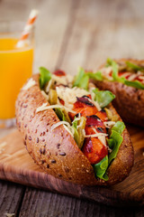 Barbecue Grilled Hot Dog With Cucumber, Cheese And Salad