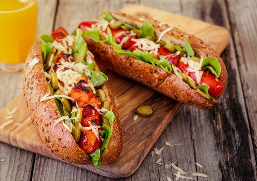 Barbecue Grilled Hot Dog With Cucumber, Cheese And Salad