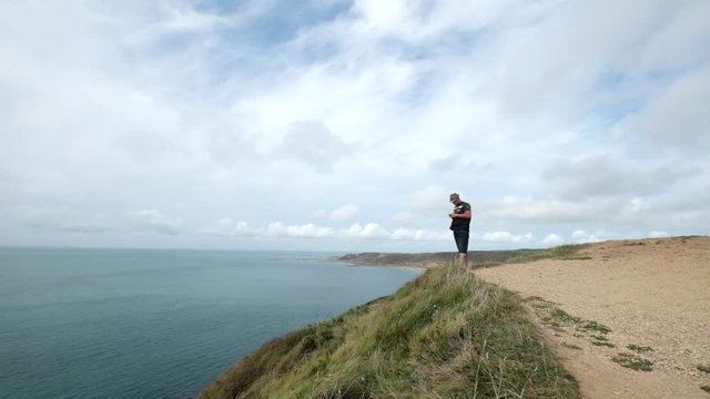 Goury coast and a tourist
