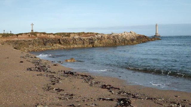 Goury cross and lighthouse
