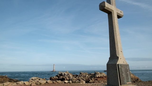 Goury cross and lighthouse