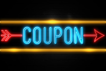 Coupon  - fluorescent Neon Sign on brickwall Front view