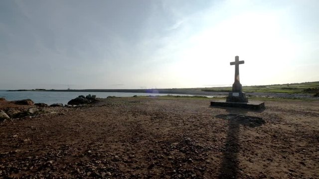 Goury cross and lighthouse