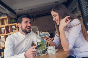 Young Couple Having Cup of Coffee