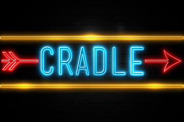 Cradle  - fluorescent Neon Sign on brickwall Front view