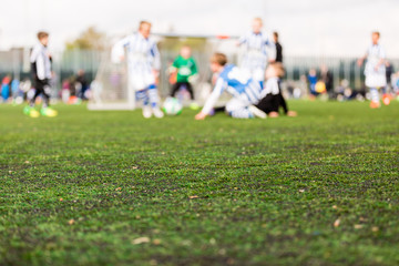 Blur of young boys playing soccer match