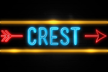 Crest  - fluorescent Neon Sign on brickwall Front view
