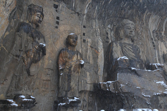 Longmen Grottoes (Longmen Caves) At Luoyang, China Under Heavy Snow. The Longmen Grottoes Are One Of The Finest Examples Of Chinese Buddhist Art.