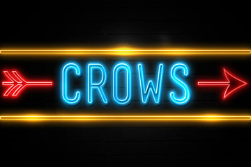 Crows  - fluorescent Neon Sign on brickwall Front view
