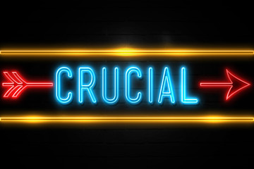 Crucial  - fluorescent Neon Sign on brickwall Front view