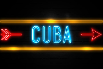 Cuba   - fluorescent Neon Sign on brickwall Front view