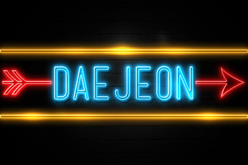 Naklejka na ściany i meble Daejeon - fluorescent Neon Sign on brickwall Front view
