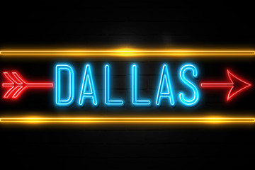 Fototapeta na wymiar Dallas - fluorescent Neon Sign on brickwall Front view
