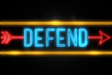 Defend  - fluorescent Neon Sign on brickwall Front view