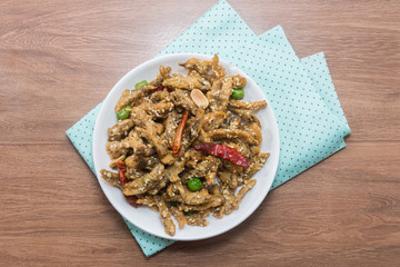 fried crispy tiny fish on plate