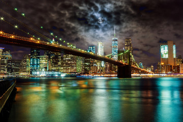Fototapeta na wymiar Brooklyn Bridge and Manhattan Skyline Night, New York City