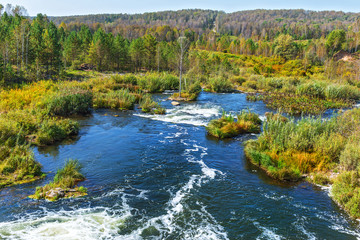 Fototapeta na wymiar Suenginskiy waterfall. The Suenga River,Siberia, Russia