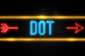 Dot  - fluorescent Neon Sign on brickwall Front view