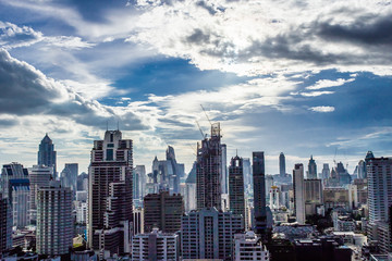 Obraz premium city buildings with shining cloud