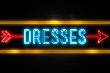 Obraz premium Dresses - fluorescent Neon Sign on brickwall Front view