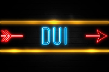 Dui  - fluorescent Neon Sign on brickwall Front view