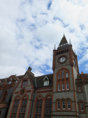 Fototapeta na wymiar Reading Town Hall under summer clouds