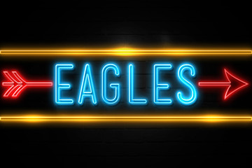 Obraz premium Eagles - fluorescent Neon Sign on brickwall Front view