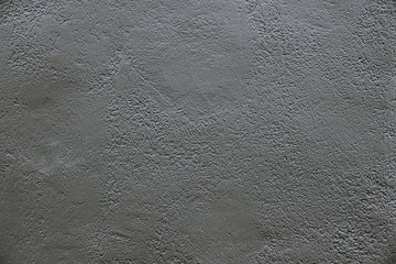 Old dark grey concrete wall background texture