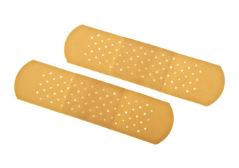 Medical adhesive plasters on a white background