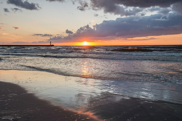 Sunset over Baltic sea. Summer landscape of polish sea with dramatic moody sky. 