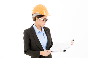Young attractive confident asian woman, orange safety hat, glass, black suit, blue shirt on white background checking blueprint.