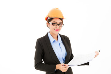 Young attractive confident asian woman, orange safety hat, glass, black suit, blue shirt on white background checking blueprint.