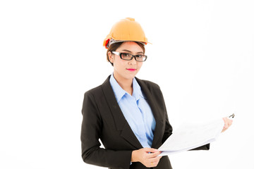 Young attractive confident asian woman, orange safety hat, glass, black suit, blue shirt on white background checking blueprint.