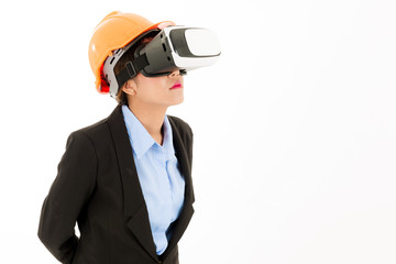Young confident asian woman, orange hat, black suit, blue shirt on white using VR headset